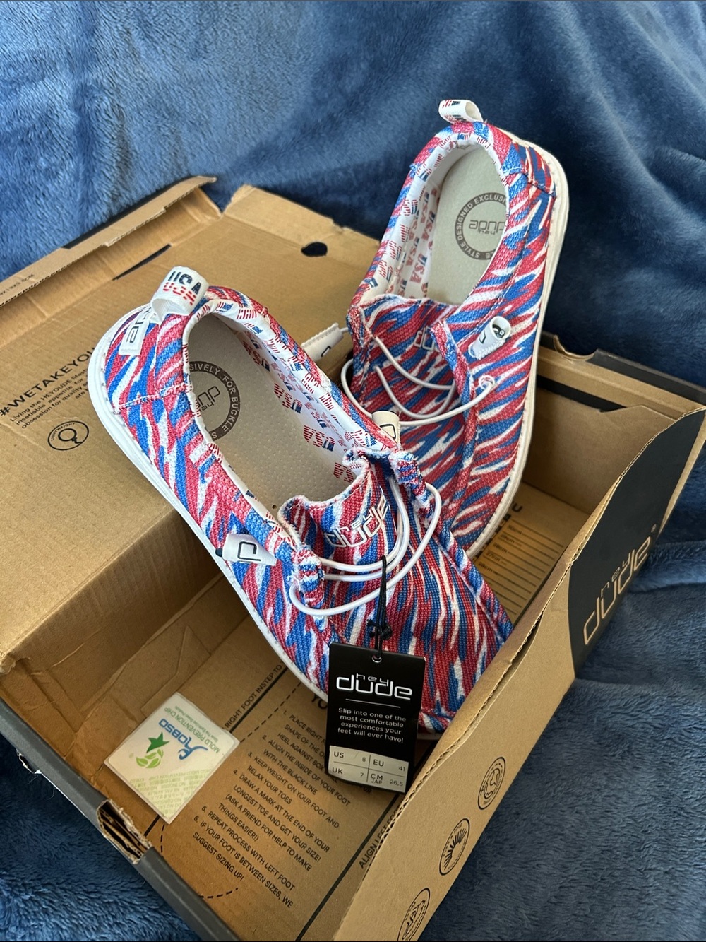 Hey Dude Unisex Slip-On Sneakers in Red, Blue, White Wave Print